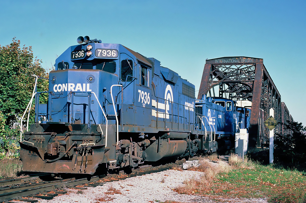 Conrail EMD GP38 No.7936 crossing the Niagara River on the International Bridge from Buffalo, New York to Fort Erie, Ontario  October 26, 1987.
