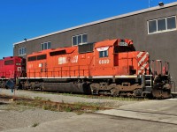 With it's old CP Rail number (5533) still visible under the #6089, DME SD40-3 a rebuilt 1967 vintage SD40 gets pulled out of the shop's west end track #1.