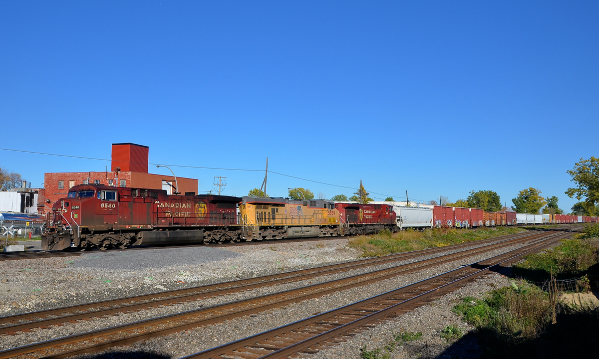 CP 143 (at one point a 100% intermodal train, but now usually filled out with mixed freight, at least east of Toronto) is departing Dorval after cooling its heels here for about 20 minutes. Power is two CP AC4400CW's sandwiching a UP unit (CP 8540, UP 5539 & CP 8574).
