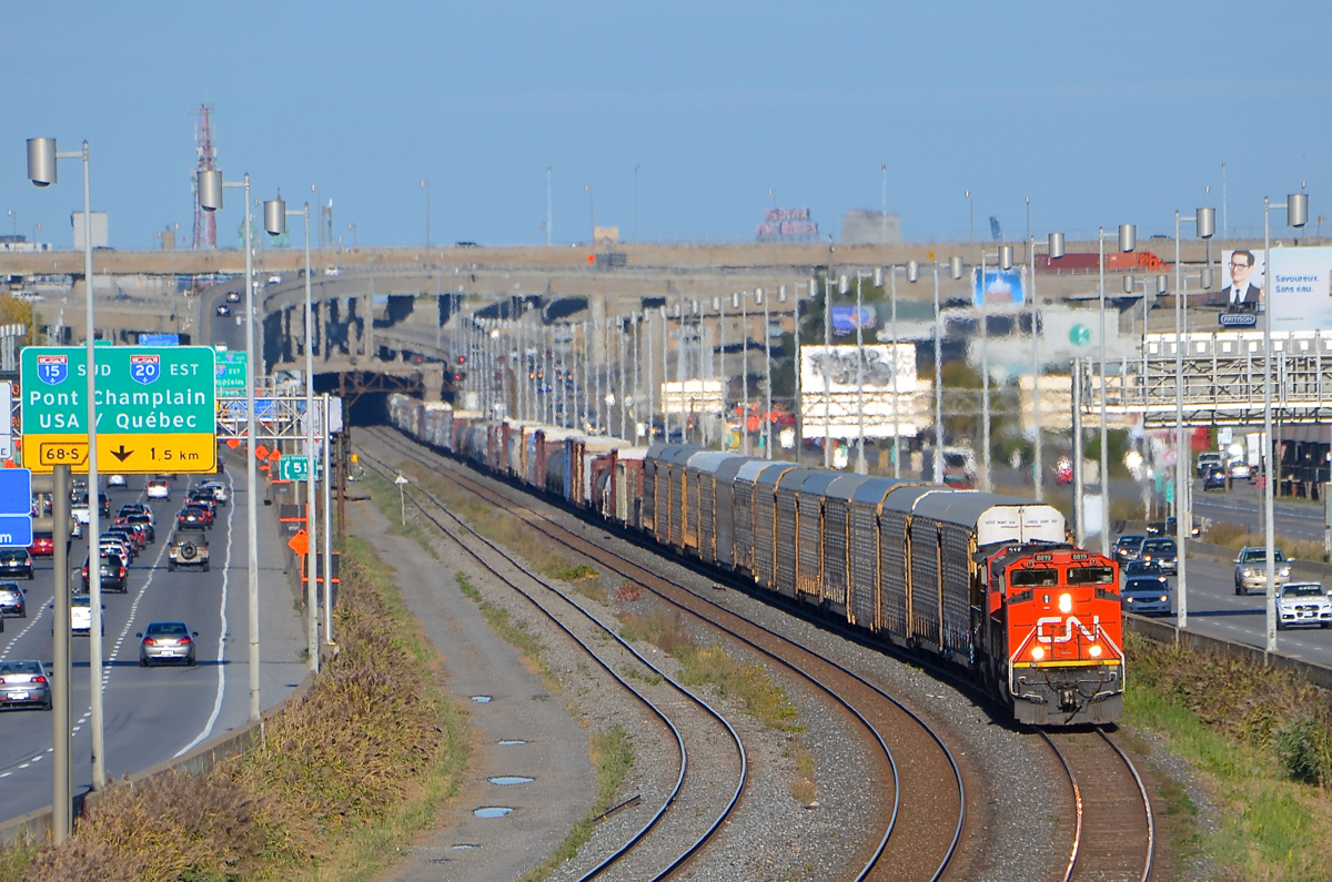 CN 401 with CN 8819 & CN 2183 for power slowly approaches Turcot West, as the train will have to wait for VIA 67 to pass on the north track of CN's Montreal Sub. Not too long after getting going again they will be stopped by the hotbox detector at MP 5 which told them they had a hot axle.