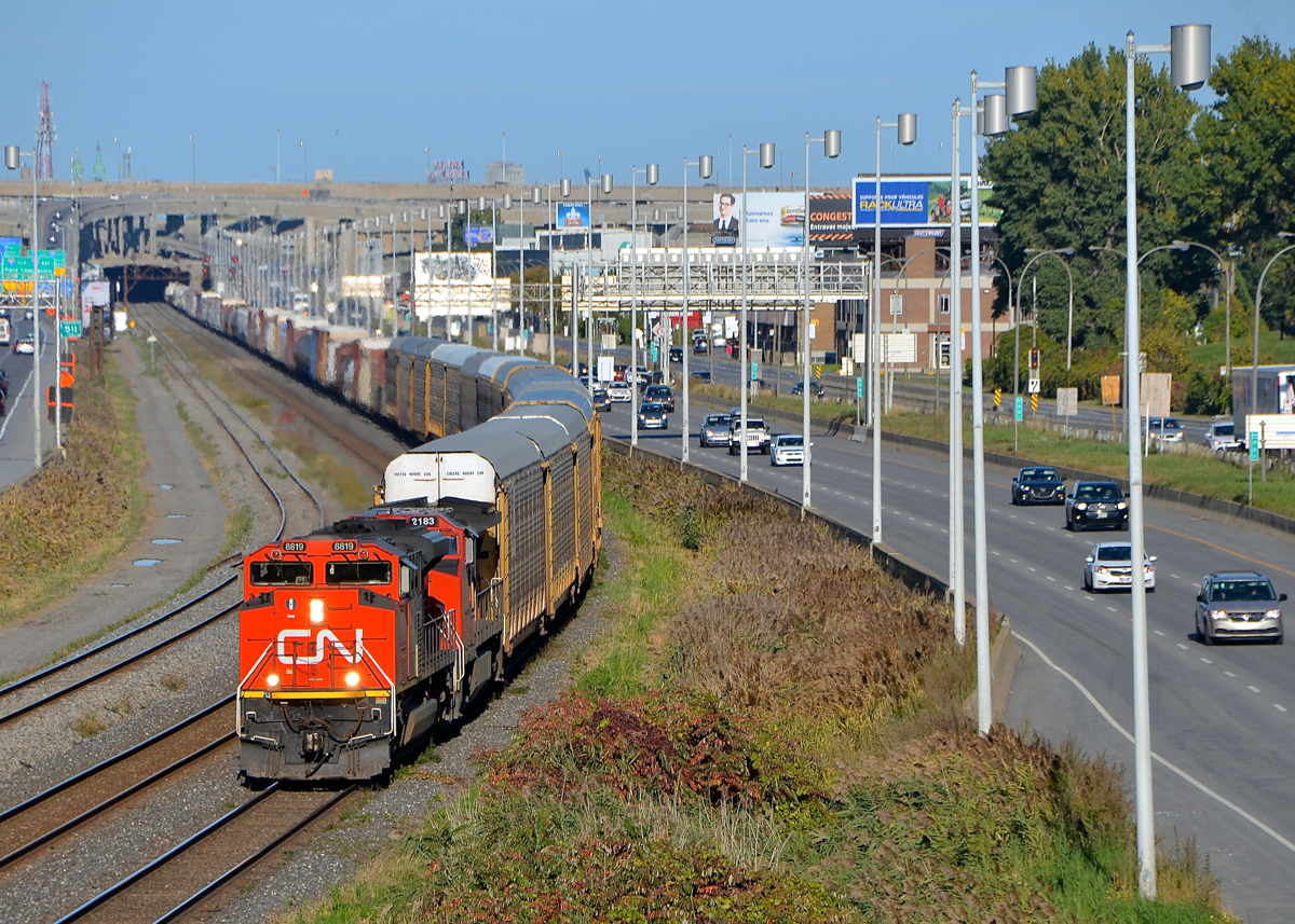 CN 401 with CN 8819 & CN 2183 for power slowly approaches Turcot West, as the train will have to wait for VIA 67 to pass on the north track of CN's Montreal Sub. Not too long after getting going again they will be stopped by the hotbox detector at MP 5 which told them they had a hot axle.