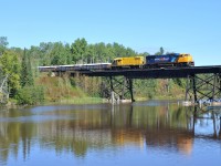 ONT 2104 - XSTR 054 crossing the trestle at Mile 69.5 with 36 cars 