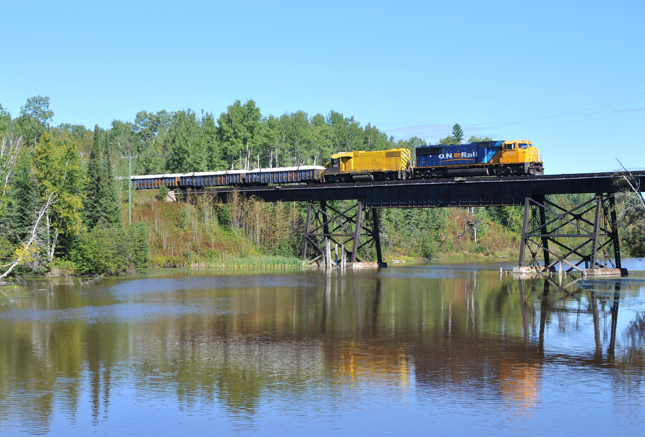 ONT 2104 - XSTR 054 crossing the trestle at Mile 69.5 with 36 cars