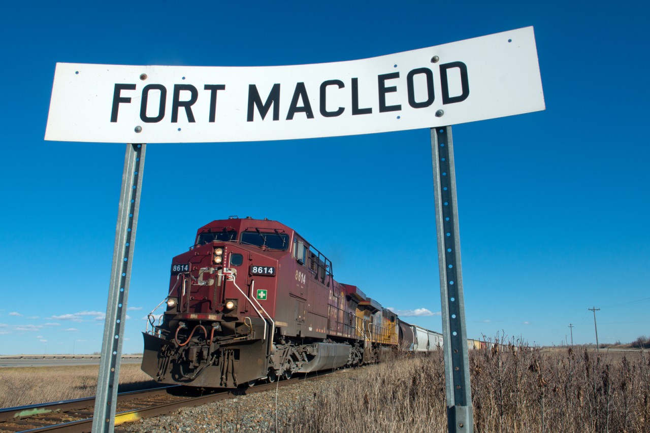 CP 8614 West brings life to an otherwise static scene just west of Fort Macleod AB on CP' Crowsnest Sub.