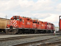 The last hurrah for the GP9's in Thunder Bay. With a record amount of grain to move off the prairie the rail companies pulled out some of the old stops. What was typical of CP with a triple set of geeps to move tonnage around Current River, in more recent times (2010 and later) a pair of GP38-2's or SD40-2's was all that was used. The 8231 has roughly 7 months left before hitting the deadline, the 8234 has 5 months left. 3115 still rolls the rails somewhere on the CP system as of October 2016.