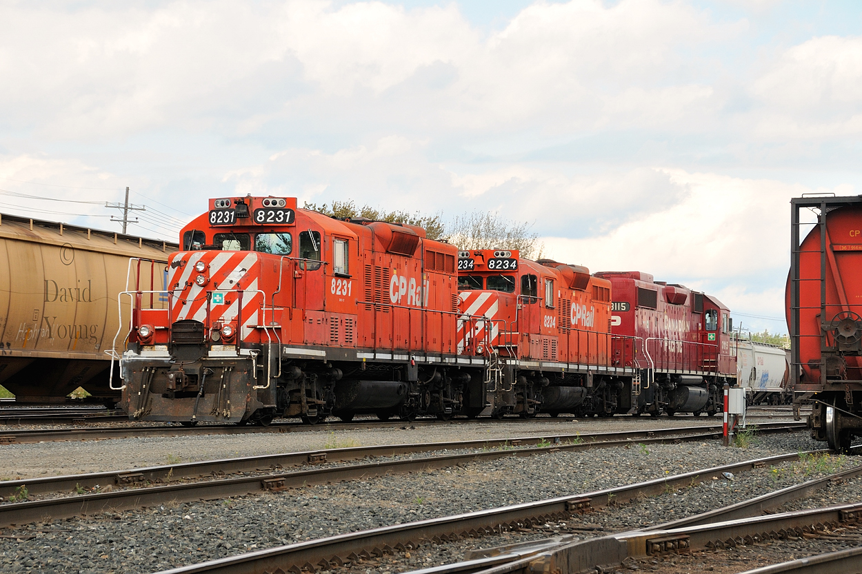 The last hurrah for the GP9's in Thunder Bay. With a record amount of grain to move off the prairie the rail companies pulled out some of the old stops. What was typical of CP with a triple set of geeps to move tonnage around Current River, in more recent times (2010 and later) a pair of GP38-2's or SD40-2's was all that was used. The 8231 has roughly 7 months left before hitting the deadline, the 8234 has 5 months left. 3115 still rolls the rails somewhere on the CP system as of October 2016.