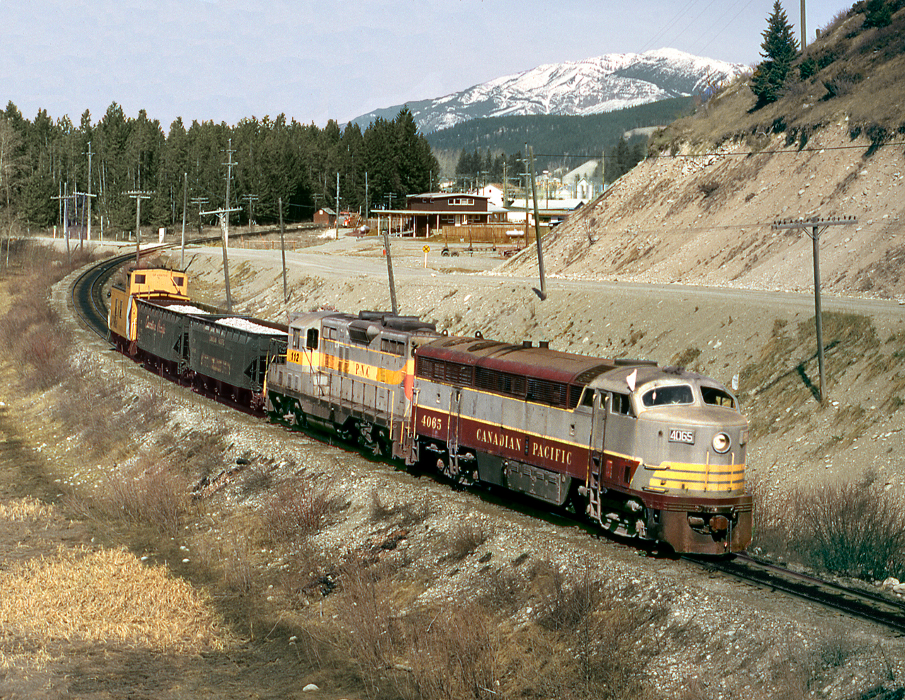 The Golden-Cranbrook KCS freight with a C-Liner and leased PNC GP9 heads from the Main Line yard to the South Yard where it will pick up the balance of its train