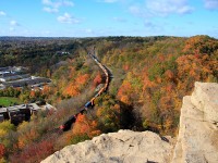 CN Q148 Descends down the Niagara escarpment grade, through the town of Dundas, Ontario amidst some fall foilage.
CN 8920, CN5743