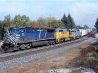 The year 2007 was a busy one for Power hungry CP. In the past CP had turned to leasing companies like Helm and GATX for motive power. This time they turned first to National Railway Equipment, which sent a mix of SD40s, SD50s and Tunnel Motors for power. It wasn't long though till CP returned  the power in favour of a deal they got from GCFX and later CEFX for leased power. Here we see a mixed bag of leased power in the form of a CEFX AC4400 and a pair of NREX SD40s. Ther SD's are ex UP and ex CP respectively. The train is rolling west past Kelso.