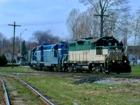 The GEXR was a very interesting operation under Railtex, as well as successor RailAmerica, with the railroad often starved for power. Thanks to the climb out of the harbour in Goderich pushing many prime movers to the max, the original GP9s didn't last long as larger power was soon needed to move heavy salt and grain trains to and from the port and on the branch to Centralia. By 1998 only #177 remained from the original group. The one time Cartier RR GP9 is seen here with a slug set, which comprised of a former KCS GP7 (only its traction motors remain operational) and a former T&P GP35 converted to a GP38 as the mother unit. The train is seen at Cowie, which is the junction where the line from Goderich meets the Guelph subdivision. By the end of RailAmerica's control of the Goderich - Exeter all three units would be gone from the roster and scrapped.