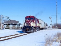 This was once the Canada Southern connecting track, shared by both CN and CP. The CASO main itself was removed not long before I took this shot. The connecting track remained in order to serve a salt company on the other side of the crossing. The salt company quit using rail service not long ago but the track remained for car storage. This past summer (2016) this track was finally removed. Thankfully the old station is still in use today.