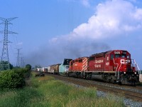 CP 5420 was the last active SD40 out of the group of former KCS units CP picked up from Helm leasing. The unit started life as KCS 675 and is seen leading train 441 out of the dip at Hornby, with an interesting dimension load behind the power.