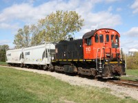 Trillium S13 110 is about to back down the one time connecting track between CN and the Canada Southern mainline. Today this is the spur to Vesuvius. The rebuilt Welland canal in 1970 cut the CASO main in half, forcing its relocation south of Welland. This spur exists to serve only one industry and the CASO yard here was relocated at the same time. Today Trillium operates all former CN and CP trackage in the area, although much has been relocated or abandoned.