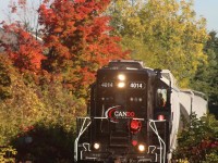 The autumn colour is beginning to take hold at mile 2 of the Owen Sound sub. as the OBRY southbound train nears the end of its trip south to Streetsville Jct. The train is about to cross a feeder creek for the Credit River, near old Meadowvale. 