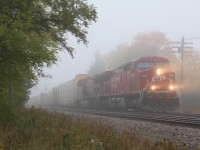 In the autumn you quickly learn to take the good with the bad as nice days are typically outnumbered by the gloomy days. a couple of stormy days can easily strip the trees of all their fall colours. Thankfully the fog can often bring dreary photos to life and that's what I was hoping for this morning as CP 234 got closer to me at Ontario Street in Streetsville. I guess I really can't complain considering how amazing this summer has been :) 
