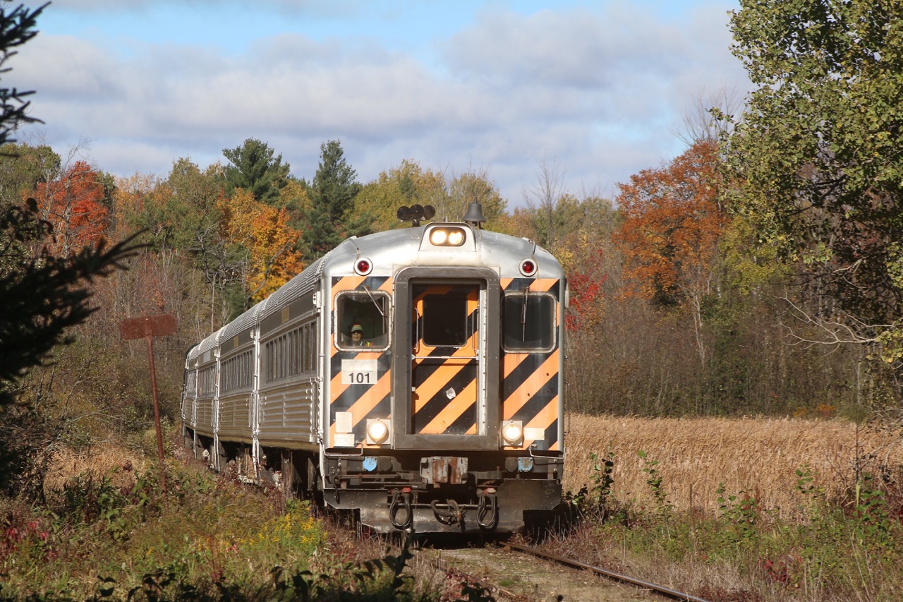 York-Durham's Halloween train is passing the swamp and fading fall colours just west of Uxbridge. Cab car #101 is a former RDC that was last used on the Guelph Jct. RR, and RS11 #3612 is busy pushing on the rear.