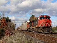 I never thought I would get excited for a pair of older Dash-9 locomotives, but it is a nice chance form the endless parade of ES44's running around lately. Here CN train 399 passes the last of the burnt autumn colours at Stewartown, today I was on the right side of a sucker hole in the clouds :)