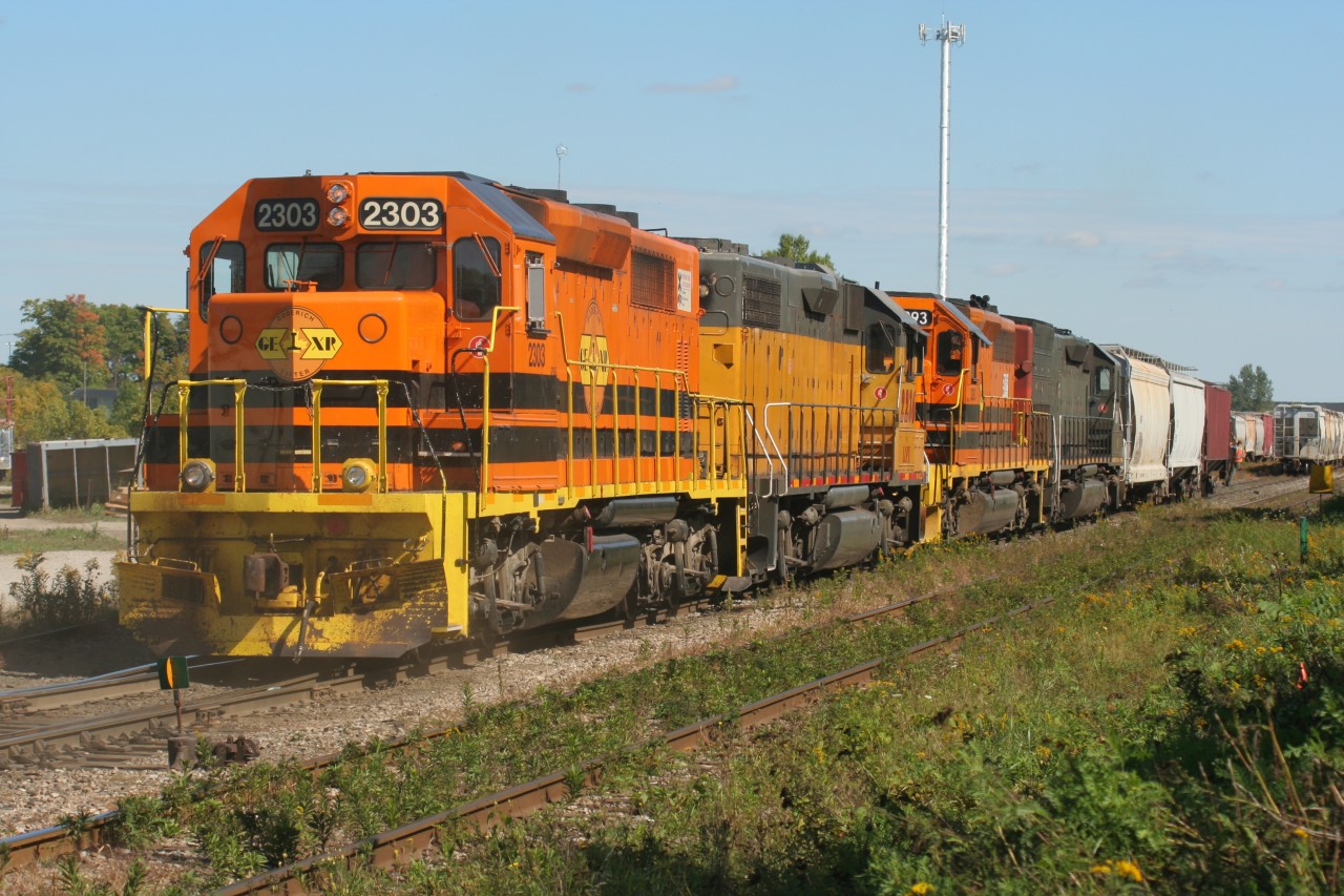 Goderich-Exeter Railway (GEXR) train 431 is seen switching the yard in Kitchener, Ontario on Sunday, September 25 with a colorful consist. With GEXR SD40-2 3394 stored with mechanical ailments, GEXR utilized two four-axle units on road trains 431 and 432 to fill in. The consist includes; GEXR GP39-2C 2303, LLPX GP38-2 2236, GEXR SD40-2 3393 and GEXR SD45-T2 3054.