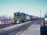 At Rouses Point, New York the D&H reaches the Canadian Border and trains continued 27 miles on subsidiary Napierville Junction to the Canadian Pacific connection at Delson Junction and trackage right to Montreal and CP's St-Luc yard. Napierville Junction MLW RS-2 No.4050 and 4051 at LaSalle, Quebec  April 28, 1965 