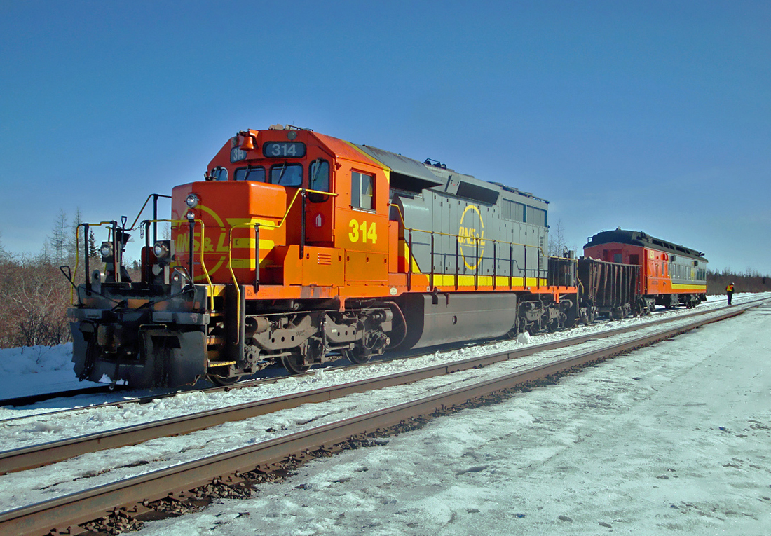 QNS&L GMD SD40-2CLC No.314 with Geometry Car No.454 waiting for a meet with a southbound, Feb.26, 2010