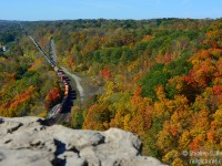 Tens of thousands of years ago, retreating ice-age glaciers carved the land creating the Niagara escarpment, and I'm sitting on the edge of it all on a beautiful fall day, I witness two trains almost side by side heading down the hill with foliage at peak. A beautiful place for a visit and last years colours were the best in years. If anyone plans to go: The place is called Websters Falls Conversation Area and you can hike in from the bottom or the top, but be warned: The peak is over-run with tourists, and it is only getting worse. And I'm not kidding, thousands of people on any given day during fall peak colour season. For best results, if sunny, the light is good from sunrise to 1030, after which it starts to become backlit for trains. Sometimes you get eastbounds, sometimes you don't, but go to enjoy, you won't be dissapointed. <br><br>Happy Thanksgiving everyone - and be sure to see the Historic Dundas photos below in the 'suggested photos' - a spot rich in history visited by many of our photographers over the years, there was a Station here after all... plus mucn more.