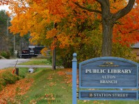 At Alton, foliage is in full bloom as the Credit Valley Explorer's second to last Fall excursion heads north toward Orangeville with horns blarin' for Station and Edmund streets. <br><br>
I'm always amazed at the little towns that dot the Orangeville-Brampton Railway - clearly the Canadian Pacific Railway's Owen Sound subdivision had a lot to do with these towns histories, and it's a pleasure to be able to photograph action in small towns since most north of the 401 lost railway service 20-30 years ago. I also didn't expect to have foliage this late in October - I tend to have an extremely busy October schedule and foliage photography can be difficult for me. This is the first image in a series I'll do from this trip, watch for more over the coming weeks.

