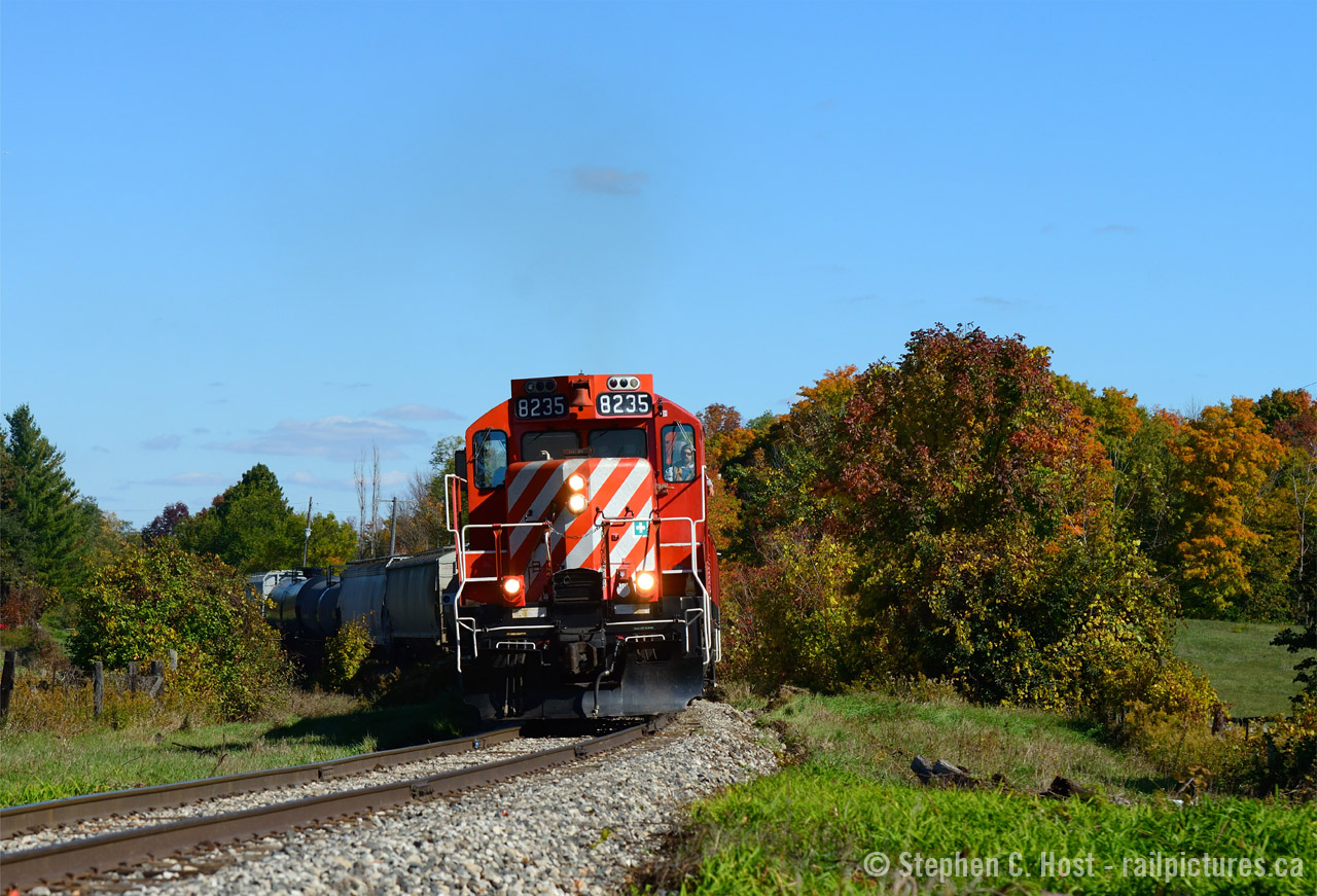 An afternoon departure for OSR out of Guelph Junction meant a lunchtime treat for this 'fan - and here we have a pair of GP9's groaning with heavy tonnage northward toward Guelph. The sound of this pair just giving 'er out of Moffat was nothing short of amazing. Add in some fall colour and I think this one turned out nice.