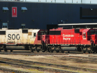 <b><i>Before and After.</i></b>
SOO 6033 and repainted Ex-SOO CP 6252 (SD60's) rest at CP's Weston Shops in Winnipeg.
