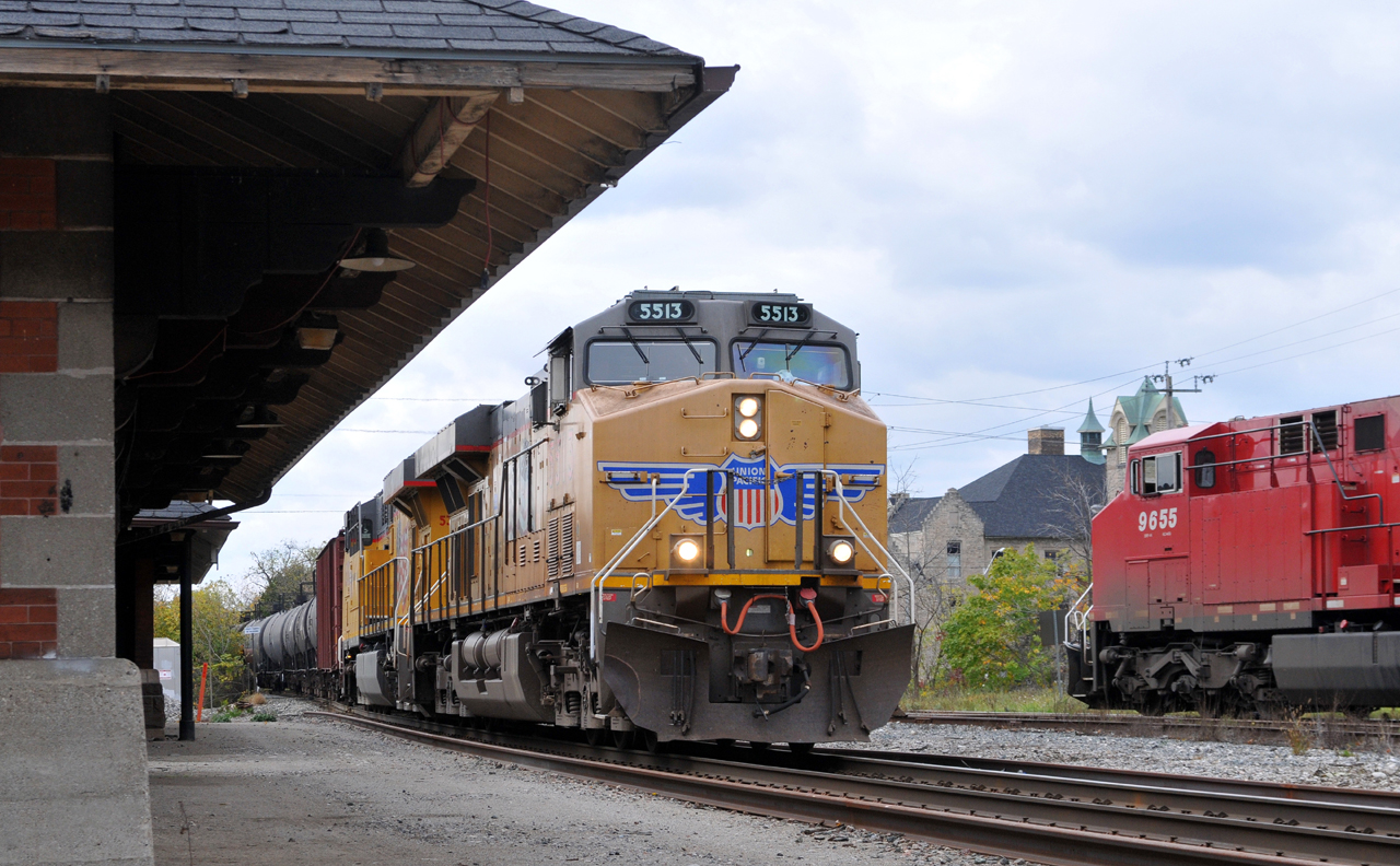 CP 650 rolls through Galt with UP 5513 - UP 5332 and 98 cars, as CP 9655W waits to make an escape once 650 clears the block
