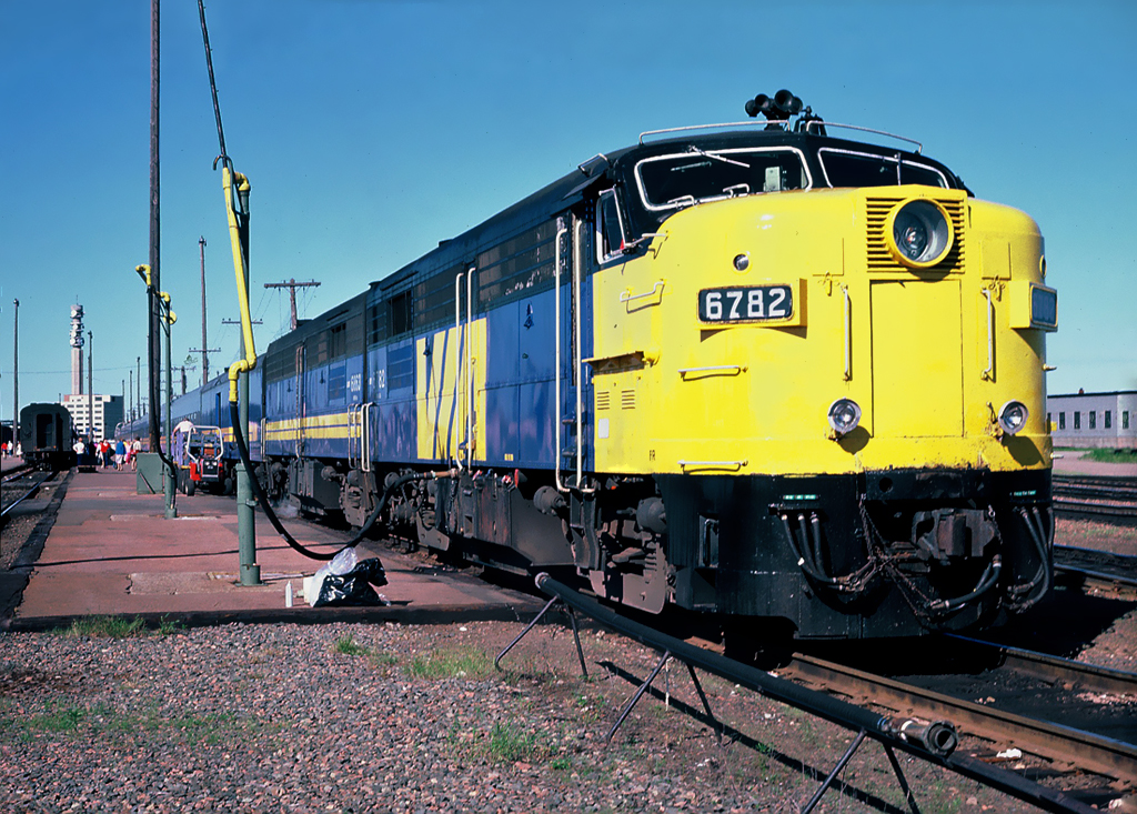 VIA Rail MLW FPA-4 6782 leading train 11 The Atlantic westbound to Saint John, New Brunswick and through the State of Maine to Montreal, Quebec. June 21, 1986.