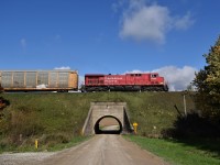 A solo CP AC4400CW is in charge of 244 as they pass over a neat old concrete bridge, made in 1909. They give a short blast of a beautiful Canadian K3 horn, as I'm busy taking pictures. There were no ES44ACs out of 2 CP trains I saw, not bad.