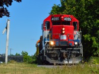 GEXR 516 inches up to Bishop Street on the former Fergus Sub as it heads to Babcock & Wilcox to lift a schnabel car.  This move was the first train south of Eagle Street in about 3 years.