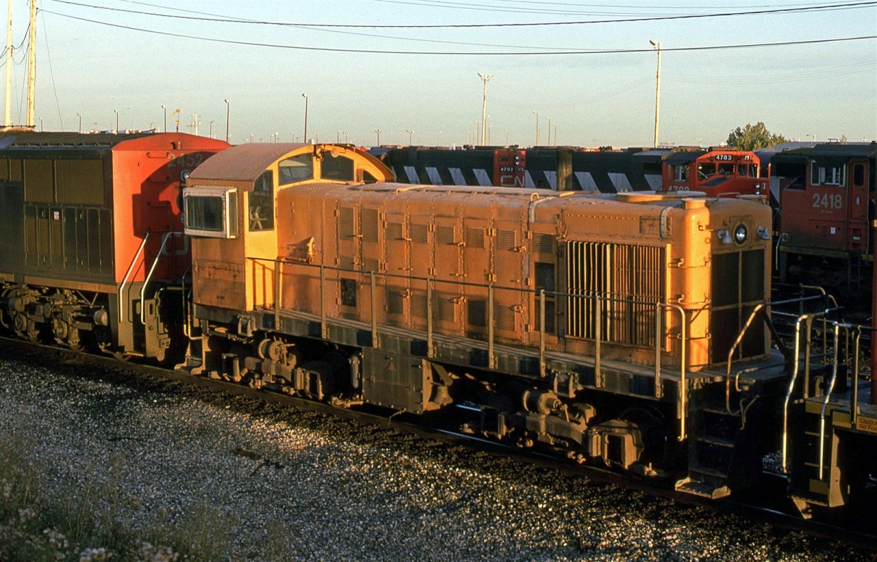 ESSO refinery's locomotive was in the CN shops for maintenance. My notes indicate that it is a Alco S-2.