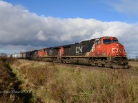 IC 2708 with CN 2689 and CN 8010 head east out of Sarnia at Waterworks Road.