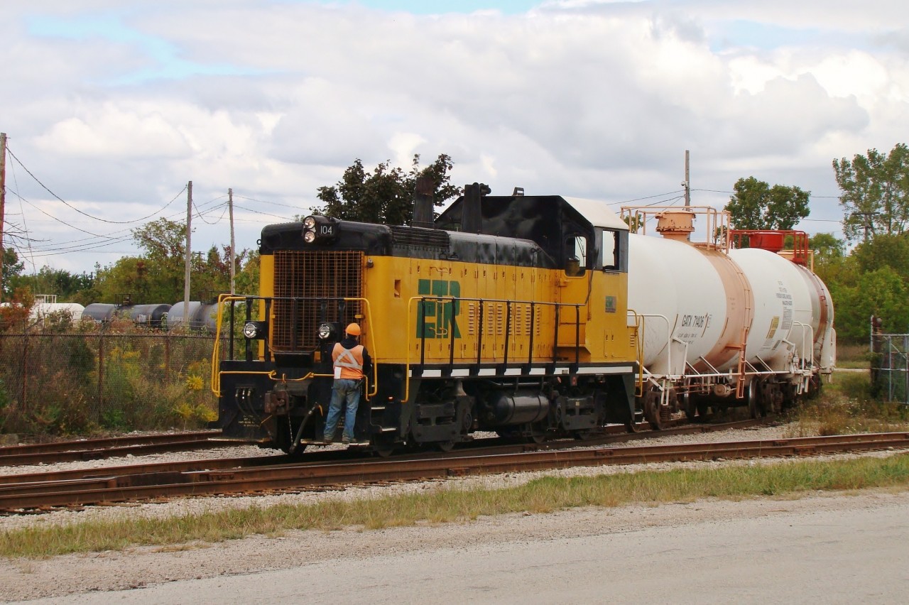 After departing Ojibway Yard less than an hour prior, Essex Terminal SW14 #104 has arrived at Amherstburg and is now shoving its train into the Honeywell complex where the crew will switch around for an hour or so before returning to Ojibway to the north in Windsor. Honeywell was idled in the summer of 2014 and as a result, trains to Amherstburg have been diminished significantly with Diageo Distilleries being the sole customer remaining.