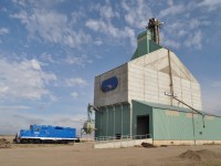 As of this writing, this is Canada's Newest Railroad. The Forty Mile Rail Line began operation Sept. 22, 2016 with a grain train of about 20 cars. Lone unit assigned is JLCX 4004. This track consists of the former CP Stirling Spur, about 50 miles in length; connecting to the outside world with CP's Montana Sub at Stirling. The new line has about 100 shareholders and will accommodate about 400,000 acres of production and involve numerous grain companies. Up to 18 grain companies will be shipping via this new operation.Shown in this photo taken only 2 weeks after the start up of the line, the lone unit is stored next to the Southern Grain building in Foremost, a busy community in Forty Mile County.