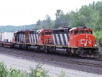 What was the hottest train on the railroad in those days (Montreal- Vancouver) heads west with a typically great lashup. Around this time, the SD50's and 60's had displaced some SD40-2's to eastern Canada, which pushed the GP40's off some of CN"s priority trains.