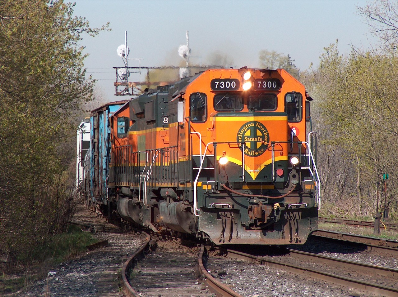 Back in 2006, BNSF power leading CN freights was nothing out of the ordinary. As evidence in this image of a likely CN 394 cruising through Georgetown in early May 2006 with BNSF 7300 and an ex-BNSF leaser (note the patch job on the side), both in that Heritage I scheme of the early BNSF days. The 7300 is an ex-CN locomotive ironically (I'm pretty sure anyway).