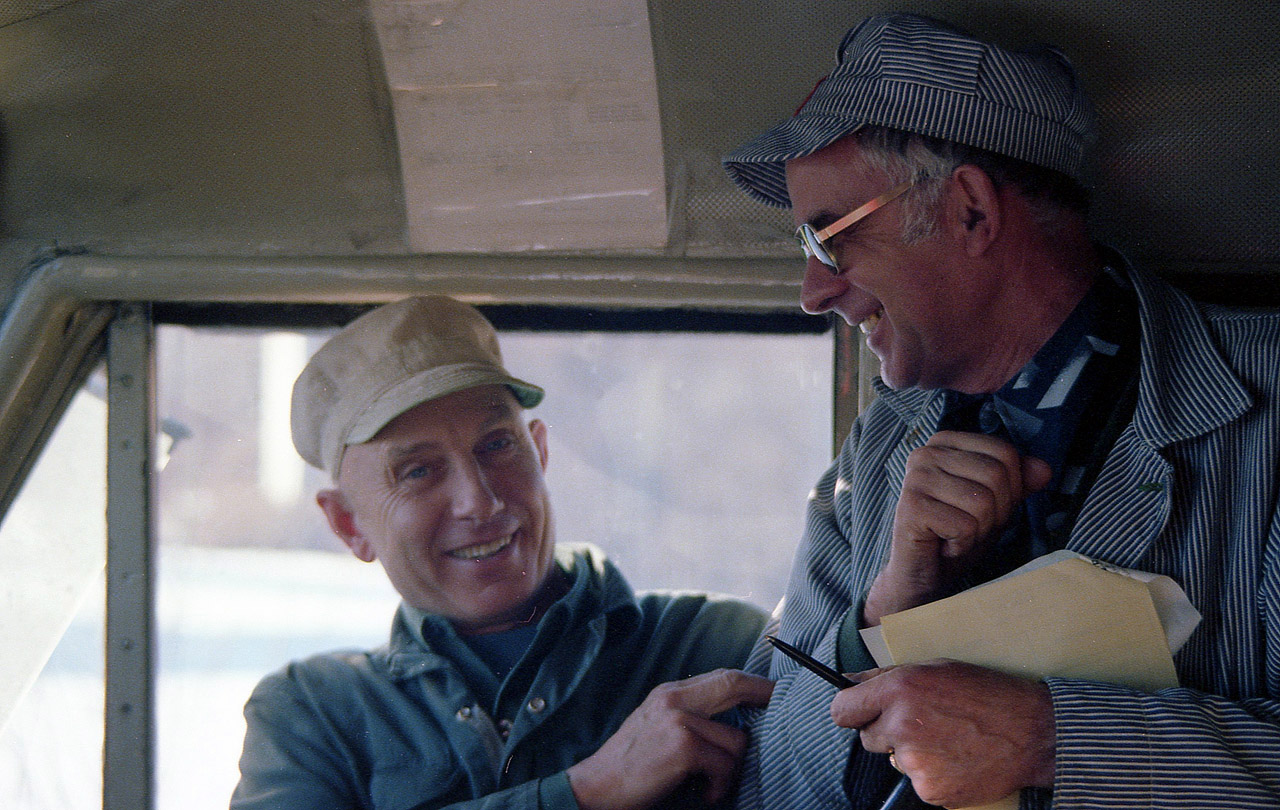 Railfanning as I knew it years ago used to be so up close and personal. Here's a fondly remembered photo taken at Bayview Jct., as westbound #83 behind VIA 6768 is held for the eastbound #74 led by VIA 6534. Its a nice sunny afternoon, and much to my surprise Vic Smith, whom I had met before, was aboard. He called me up. It turned out that William Bell (on the left) was on his last run, and so photos were in order to commemorate the occasion. Here they are 'kabbitzing'...or, 'goofing off' if you'd rather, after I took the "official" retirement shots. To think they were worried that the last run would come with no one to take their photos en route!!!  The fun days of interacting with employees on the railroads, especially the Class 1s, is mostly over and to many of us this part of being trackside is sorely missed. The Good Old Days already? My gosh.............