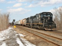  CFMG - Chemin de Fer de la Matapédia et du Golf (Matapédia and Golf Railway) GMD SD40 6910 and 6902 on the New Brunswick East Coast Railway, dropping off cars in Bathurst, N.B. April 02, 2009.