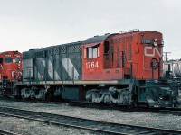 CN MLW RSC-14 1764 and MLW C-630M 2009 at the Bathurst yard May 03, 1987.