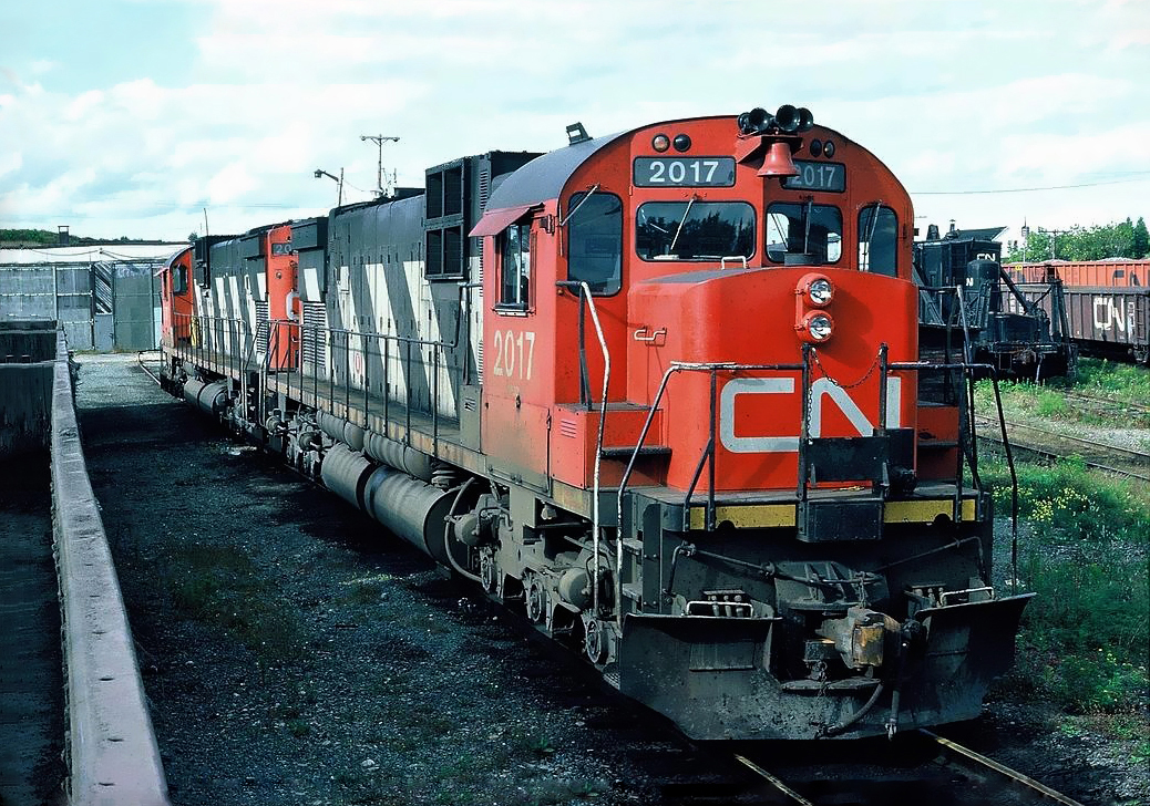 Two CN MLWs C-630M 2017 and 2035 parked in the Bathurst CN yards, September 07, 1986.