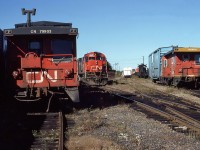 CN MLW M-636 No.2309 with a Transfer (yard) Caboose CN76703, and a mainline Caboose CN79903.