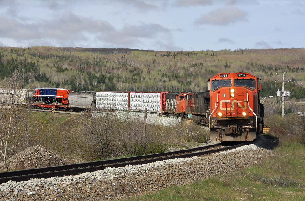 CN Rail SD75I No.5707 leads one of six GT38ACe exports to PTKA Sumatras, Indonesia; it was shipped from Electro-Motive London, Ontario en route to Halifax, NS for overseas shipment.