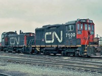CN GMD/CN SW1200RM. Remanufactured at Pointe St. Charles main shops in Montreal; Nos.7100-7107 with SW1200SW and long hoods of GP9s.