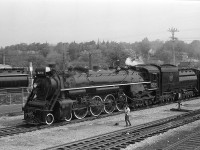 CN U2g Northern 6218 is shown arriving in Guelph near the station in 1969. It is passing sister U2e Northern 6167 (note tender in background), another former excursion steamer, that was on static display for years downtown just east of the station (until being <a href=http://www.railpictures.ca/?attachment_id=2905</a><b>moved across the tracks in 2010</b></a>). Today 6218 is also on static display, <a href=http://www.railpictures.ca/?attachment_id=10469><b>in Fort Erie</b></a>.