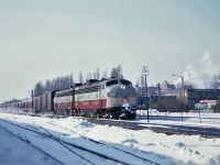 Canadian Pacific GMD FP7(A) 1402 on train 8 "The Dominion" is running off its last few miles to Montréal's Windsor Station on a cold February day, at Westmount station Feb. 16, 1965