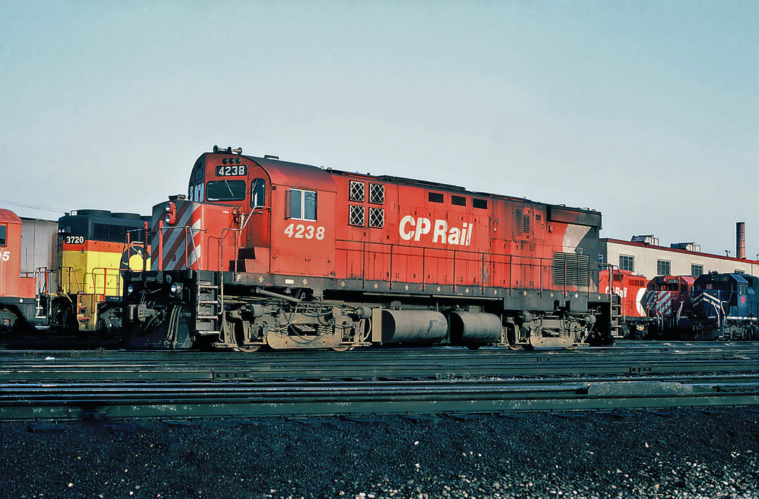 CP Rail MLW C-424 No.4238 at CP's Agincourt yard with Chessie System (B&O) GP40 3720 and an ex-Mopac SD40.