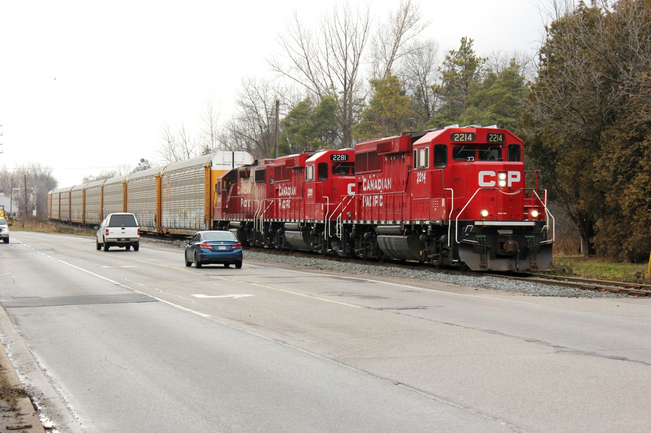 Another view of a southbound CP interchange train at Freeport in south Kitchener. Power on this day was 2214-2281-3045. It is always cool to see the size comparison between cars and trains here!