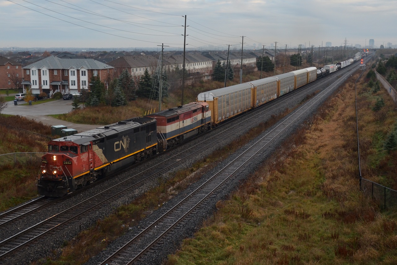 On a misty morning, CN M371 heads past CN Bovaird with a pair of cowls. The right one was not leading but in today's time, this is definitely considered a good lashup. I think the last time I saw a pair of cowls was back in 2014!